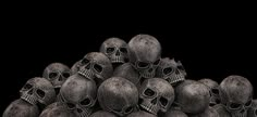 a pile of skulls sitting on top of each other