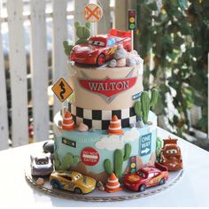 a birthday cake with cars and traffic signs on it