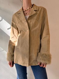 "- Vintage Suzy Shier beige jacket with faux fur cuffs - Suede leather shell with lining - A couple very small marks throughout - Tagged M  Chest: 18\" Length: 27.5\" Sleeve: 23\" Shoulder: 16.5\"" Trendy Beige Leather Jacket For Winter, Beige Fur Coat With Faux Fur Trim For Spring, Beige Single-breasted Leather Jacket For Winter, Vintage Spring Outerwear With Faux Fur Trim, Vintage Fur Coat With Faux Fur Lining For Spring, Faux Fur Jacket Outfit, Fur Vest Outfit, Vest Outfits Aesthetic, Fur Jacket Outfit