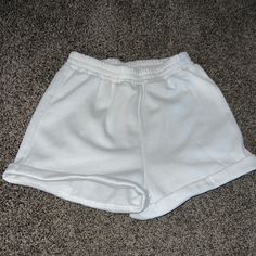 White Sweatpants Shorts. Size Small. Never Worn And Has No Stains White Stretch Pants With Built-in Shorts, High Waist White Bottoms With Built-in Shorts, Casual White Pants For Day Out, White Stretch Shorts With Pockets, White Stretch Bottoms With Elastic Waistband, Stretch White Pants With Built-in Shorts, Trendy White Stretch Bottoms, White Bottoms With Elastic Waistband For Day Out, White Stretch Shorts For Loungewear