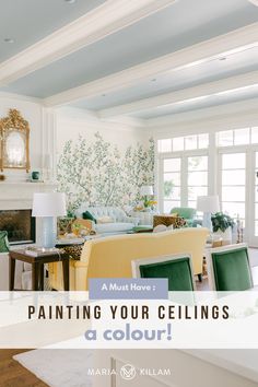 a living room filled with lots of furniture and walls covered in floral wallpaper that reads, painting your ceilings a color