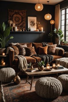 a living room filled with lots of furniture and candles on the coffee table in front of a large window