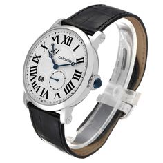 Cartier Rotonde 18k White Gold Silver Dial Mens Watch W1556202. Manual winding movement. 18k white gold case 42.0 mm in diameter. Circular grained crown set with the blue spinel cabochon. Exhibition sapphire crystal case back. . Scratch resistant sapphire crystal. Silver guilloche dial with black roman numerals. Blued steel hands. Secret Cartier signature at VII. Large date window located between 7 and 8 o'clock position.  Small seconds sub-dial above the 5 o'clock position. Power reserve indica Iwc Watches, Rolex Date, Blue Spinel, Silver Water, 5 O Clock, Gold Watch Men, Blue Steel, Gold Case, Skeleton Watch