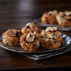 cookies with almonds and cranberries on a plate, ready to be eaten