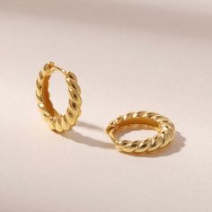 Description - Complete your beach day fit with our Seaside Twisted Hoops. Made of high-quality 24k gold plating technology, making them perfect for everyday wear! Stack with our Seashell Earrings for a cute everyday look. • Width : 16mm • Premium Alpha Brass + 24k gold plating • Water-Resistant & Sweatproof - shower, swim, and exercise with it, the color remains perfect • Hypoallergenic Jewelry Care: - Wipe with a soft cloth + jewelry cleaner every 3-4 months for a clean polished look. Sunnie Jewelry 1 year warranty Trendy Gold Hoop Earrings For Beach, Casual Gold Earrings For Beach, Casual Gold Hoop Earrings As Gift, Casual Gold Hoop Earrings For Gift, Minimalist Gold Hoop Earrings For Summer, Seashell Earrings, Hypoallergenic Jewelry, Jewelry Outfit, 4 Months