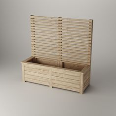 a wooden box with two compartments and dividers on the sides, in front of a gray background