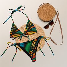 Be both comfortable and stylish all summer long with this recycled drawstring bikini decorated with an all-over print. It's made from soft, double-layer recycled polyester and features UPF 50+ protection. Tie the straps as you wish, and enjoy your swims! The pattern was entirely made by me * Soft, stretchy fabric with UPF 50+ protection * Size up to 6XL * Bikini top comes with removable padding for added comfort * Several ways to tie and personalize the bikini * Full color design options for swi Adjustable Drawstring Summer Swimwear, Adjustable Drawstring Swimwear For Poolside, Multicolor Drawstring Swimwear For Sunbathing, Multicolor Swimwear With Drawstring For Sunbathing, Adjustable Drawstring Swimwear For Swimming, Adjustable Drawstring Swimwear, Adjustable Swimwear With Drawstring, Vacation Swimwear With Drawstring For Sunbathing, Beachy Adjustable Swimwear With Drawstring