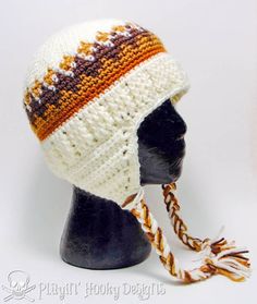 a knitted hat on top of a mannequin head