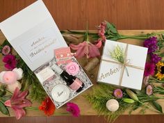 flowers and cards on a wooden table