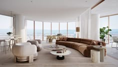 a living room filled with lots of furniture and large windows overlooking the city below it