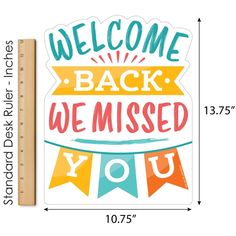 the welcome back we missed you sticker is shown next to a ruler that reads,'welcome back we missed you '