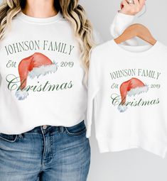 Welcome to my shop where you can find your Motherhood apparel needs!  Want to match your family this Christmas in a unique way?  These shirts and sweatshirts are for you!  Wear them with pajama pants for cozy family matching pajamas, or jeans for a classy, elevated look! PRODUCT INFO T-Shirt: This bestseller unisex jersey short sleeve tee (Bella + Canvas) fits like a well-loved favorite. Incredibly soft cotton and quality print make users fall in love with it over and over again. Made with 100% Casual Customizable Christmas Tops, Casual Christmas Tops With Customizable Details, Customizable White Christmas Tops, Casual Customizable Tops For Christmas, Customizable Christmas Gift Tops, Customizable White Tops For Holiday, Customizable Cotton Tops For Holidays, Family Matching Christmas Pajamas, Holiday Pjs