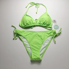 Beautikini Women's Size Large Neon Green 2 Piece Bikini Swimsuit Swimwear. Bikini Top And Bottom. Halter Neckline. Bottoms Have Side Ties In Both Sides. New With Tags. Never Worn. B121 Tags: Swim,Swimwear,Swimsuit,Casual,Summer,Beach,Lounge,Poolside,Spring,Fall,Vacation,One Piece,Sexy 3-15-24 Green Triangle Top Tankini For Vacation, Green Fitted Tankini With Tie-side Bottom, Fitted Green Tankini With Tie-side Bottom, Fitted Green Swimwear For Vacation, Fall Vacation, Ruched Tankini, Animal Print Swimsuit, Beach Lounge, Swimwear Bottoms