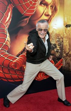 an older man is dancing on the red carpet at the spiderman movie world premiere