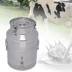 a cow standing next to a large milk container with water pouring out of it's side