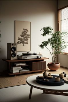 a living room with a potted plant on the coffee table next to a record player