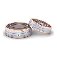 Platinum Love Bands by Jewelove This unique pair of platinum love bands has a single diamond of 0.08 cts. set in each ring. The bands have 2 grooves in the center & edges in 18K Rose Gold. The center part is in matte finish with hi-polish edges. We can also make them in full hi-polish, please mention in the Special Instructions Box on the Cart Page you need full hi-polish on the bands. Metal : Platinum & 18K Rose Gold Platinum Purity : 95% Gold Purity : 18K Purity Mark : Pt 950 & 18K Estimated W Anniversary Bands With Single Diamond, Single Diamond Anniversary Bands, Anniversary Diamond Band With Single Diamond, Diamond Couple Rings For Anniversary With Round Band, Diamond White Couple Rings With Diamond Accents For Anniversary, Couple Rings With Single Diamond Round Band, Diamond Couple Rings For Anniversary, Couple's Solitaire Diamond Rings, Couple's Diamond Rings For Promise