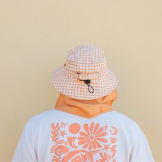 The OG is back baby!! We're bringing back Season Ones favourite Style - the Orange Gingham Plow Hat. This hat comes in XS, S, M, & XLWe've got toddlers, kids, teens, men, women / adults coveredRefer to Size Guide All Surf Hats come WITH the legionnaires, not separately. We want to provide you with all the tools to keep you sun safe every surf - you may choose to go with or without it at your own risk after purchase. Features: recycled nylon outer wide brim bucket firm front half brim netted lining - reduces slipping dual tightening mechanism water escape panel soft neoprene chin strap optional: legionnaires flap Colour: Orange + Beige Surf Hat, Surf Hats, Orange Gingham, Colour Orange, Wide Brimmed, Gingham, Size Guide, Surfing, Recycling