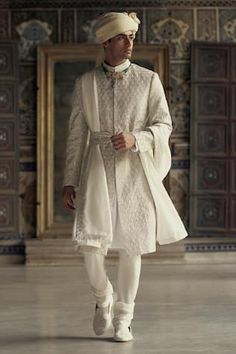 Ivory sherwani with tonal dori, silver dabka and sequin embroidery in geometric pattern. Paired with kurta and churidar. - Aza Fashions Rhea Kapoor, Mira Rajput, Sanya Malhotra, Anushree Reddy, Sara Ali Khan, Rohit Bal, Embroidered Belt, Tarun Tahiliani, Jacqueline Fernandez