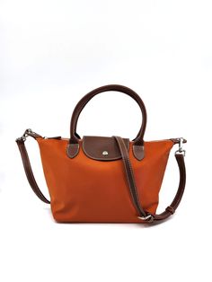 Colors: Orange Brown Nylon Shoulder Bag With Double Handle, Brown Nylon Double Handle Shoulder Bag, Brown Nylon Shopping Bag, Brown Nylon Bags With Double Handle, Casual Nylon Shoulder Bag With Detachable Handle, Orange Casual Nylon Shoulder Bag, Casual Orange Nylon Shoulder Bag, Brown Nylon Bag With Adjustable Strap, Casual Nylon Bag With Detachable Handle