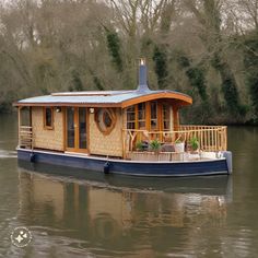 a house boat floating on top of a river