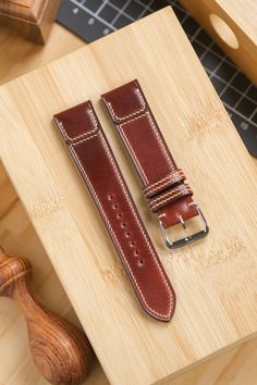 Shell Cordovan Strap in Garnet Red in the style made for a JLC Reverso  Leather: Garnet Red Shinki Shell Cordovan  Tannage: Vegetable Tanned Thread: Khaki. Tone-on-tone thread also available at your request. Lining: Zermatt Leather in Tan Thickness: 4mm at the flap, tapering to 2.2mm Classic Red Watch Bracelet Strap, Classic Red Adjustable Watch Bands, Red Classic Adjustable Watch Bands, Red Watch With Adjustable Leather Strap, Red Leather Strap For Watches, Classic Red Watch Bands For Gift, Classic Red Watch Bands As Gift, Red Adjustable Leather Strap For Watches, Red Rectangular Watch Band With Bracelet Strap