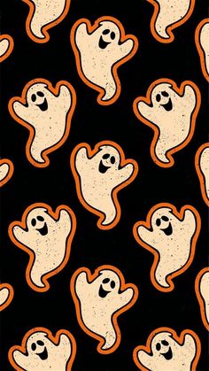 a black background with orange and white ghost faces