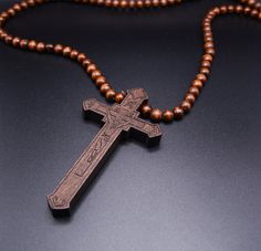 Elevate your style and showcase your faith with our stunning wooden cross necklaces for men. Crafted with meticulous attention to detail and using premium materials, our men's cross necklaces are the perfect combination of fashion and spirituality. Material: Top Quality Rosewood + Stainless Steel. Rosewood has a good influence on the human brain nervous system. Pendant size: 1.06"(27mm) X 1.58"(40mm) Adjustable 56cm-61cm/22"-24" length high quality stainless steel cross chain. WARNING: CHOKING H Wooden Cross Pendant, Wood Cross Necklace, Wooden Cross Necklace, Wood Necklace Pendant, Pendants For Men, Cross Necklace For Men, Brown Leather Necklace, Cross Jewelry Necklace, Wooden Watches For Men