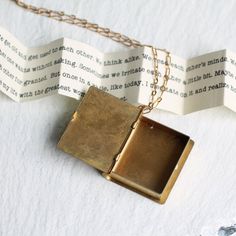 Book Locket Necklace Secret Message Locket Personalized | Etsy Secret Message Locket, Book Locket Necklace, Graduation Gifts For Daughter, Silk Purse, Book Necklace, Book Locket, Graduation Necklace, Literary Gifts, Handmade Tags