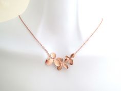 "Rose gold orchid flower necklace ♪ Color: rose gold  ♪ Pendant size: 33mm x 17mm  ♪ 16K rose gold plated over brass   ♪ Necklace length: 15-19\" ♪ Packed individually in a gift box Handmade with Love by Clara ---------------------------------------------- ► Enter shop here : https://www.etsy.com/shop/jeweltown All Photos, Designs & Text Copyright © Jeweltown" Rose Gold Flower Necklace For Parties, Rose Gold Flower Necklace With Delicate Chain, Party Rose Gold Necklace With Flower Charm, Rose Gold Flower Necklace For Bridesmaid, Rose Gold Flower-shaped Necklace For Birthday, Birthday Rose Gold Flower Shaped Necklace, Birthday Rose Gold Flower-shaped Necklace, Delicate Rose Gold Necklace For Birthday, Orchid Jewelry