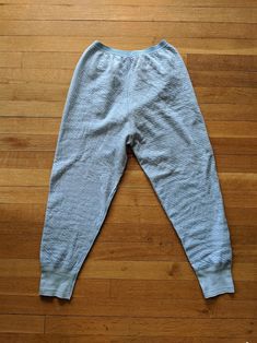 "Wow, I am obsessed with these vintage thermal leggings. They are in wonderful condition and I love the soft, pale blue. They are a super soft wool/cotton blend on the outside, and 100% cotton on the inside. So they are warm AND soft! Features a stretchy, elastic waist. They are in wonderful vintage condition. They look hardly worn, if at all! Outer: 50% wool ; 50% cotton Inner lining: 100% cotton Imported Danish Fashion by Mark Hansen Made in Denmark. Found in Portland, Maine About a size Small Light Blue Cotton Bottoms For Winter, Cozy Loungewear Leggings, Light Blue Cotton Pants For Loungewear, Light Blue Cotton Lounge Pants, Light Wash Cotton Bottoms For Winter, Winter Light Wash Cotton Bottoms, Solid Cotton Sweatpants For Daywear, Solid Color Cotton Sweatpants For Daywear, Soft Features