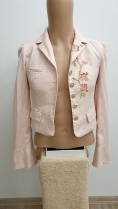 Kenzo top luxury women's embroidered jacket  Excellent condition  Gorgeous quality  100% lin Lining 100% coton  Color pink rose with flowers embroidered  3 front pockets (still not used yet) 5 buttons closure  Very long sleeve or short jacket( style) Size Fr-38, (S) Jacket length 46cm/ 18inches Sleeve length 64cm/ 25,1/4inches Sleeve width 16.5cm/ 6,1/2inches Shoulder to shoulder 38cm/ 15inches Chest 43cm/ 17inches Waist width 38cm/ 15inches Hip width 41cm/ 16inches All measurements made in flat position Flowers Embroidered, Embroidered Jacket, Short Jacket, Luxury Women, Jacket Style, Bulgaria, Jackets & Coats, Jackets For Women, Sleeve Length