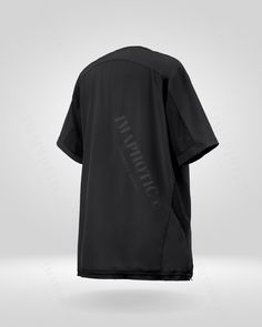 the back view of a black shirt with white lettering on it and an embroidered logo