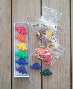 there are many small plastic animals in the box and one is packaged with a thank you tag