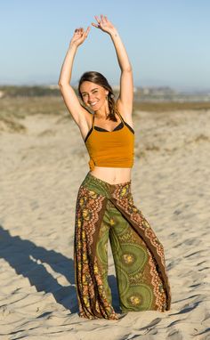 "Harem Pants, Belly Dance, Tribal Fusion Yoga Pants, Genie Pants, Renaissance Festival Clothing, Olive Green, Elephant Pants, Festival Pants Get ready to dance, lounge, hit the festival scene or go to the beach in these elegant and vibrant open leg pants. The front waist band is 3.5in wide waist band, while the back is a high quality elastic sew. This gives a perfectly comfortable and very flattering look for all shapes and sizes. The pants can be worn in many ways to change the look and feel. T Coachella Pants, Buddha Pants, Green Thai, Thai Pants, Genie Pants, Green Elephant, Elephant Pants, Pants Boho, Etsy Boutique