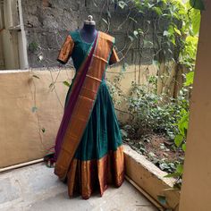 Wedding lehenga choli/ lehenga set with dupatta / teens lehenga/ bridal lehenga/ kids lehenga / narayanpet lehenga / crop top lehenga/ lehenga USA / Langa voni / voggish / green purple lehenga / pattu pavadai Here is a beautiful and traditional Indian pattu narayanpet cotton lehenga in green color paired with purple border dupatta is a stunning piece for your upcoming parties!! It's a 3 piece set that includes skirt , can be done in other combinations and customizable !! Please contact us for en Anarkali Floor-length Choli For Traditional Ceremonies, Traditional Green Floor-length Lehenga, Traditional Floor-length Green Choli, Traditional Green Floor-length Choli, Green Floor-length Traditional Choli, Bollywood Style Pre-draped Saree With Tilla For Navratri, Festive Pre-draped Saree With Tilla, Floor-length Sharara With Pallu For Traditional Ceremonies, Floor-length Anarkali Set For Traditional Ceremonies