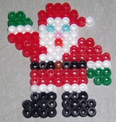 a close up of a santa clause bead decoration