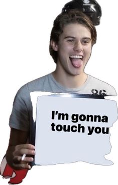 a young man holding up a sign that says i'm gonna touch you