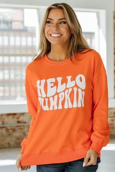 Get cozy and festive with our Hello Pumpkin Graphic Sweatshirt! With a cute pumpkin graphic, this sweatshirt is perfect for fall and Halloween. Stay warm and stylish with this must-have piece for your wardrobe! Model Info: Models are 5'7", Size 2, wearing smalls Material: 50% Polyester + 50% Cotton Pumpkin Graphic, Fall And Halloween, Hello Pumpkin, Cute Pumpkin, Diy Shirt, Vibrant Orange, Getting Cozy, Crop Tank