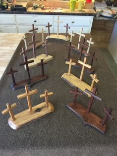 wooden crosses are arranged on the kitchen counter