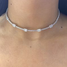 This exquisite choker necklace is crafted from 18Kt white gold and adorned with a total of 2.35 carats of diamonds. The diamonds are of G-H color and VS2 clarity, ensuring a dazzling brilliance and excellent quality. The necklace features both baguette and round cut diamonds, creating a beautiful and sophisticated design that elegantly complements any outfit. Luxury Diamond White Rectangular Necklace, Fine Jewelry White Gold Diamond Choker Necklace, Cubic Zirconia Choker With Diamond Accents, Dazzling Diamond White Choker Jewelry, White Diamond Choker Necklace, White Gold Diamond Choker Necklace, Luxury Diamond Choker For Formal Occasions, Classic Diamond Choker Jewelry, Dazzling Diamond Accented Choker