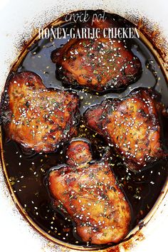 close up of cooked meat with sesame seeds and seasoning