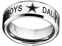 a ring with the words boys's dallas written in black and white on it