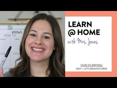 a woman holding a pen in front of a whiteboard with the words learn @ home