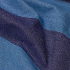 the blue and purple fabric is very close to it's surface with no visible stripes