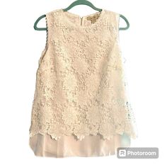 Nwt Charlie Paige White Sleeveless Eyelet Floral Lace Overlay Tunic Top Sz Small So Feminine White Eyelet Lace Overlay On A White Sheer Longer Lining. So Many Ways To Wear This Dressed Up For A Lot Of Occasions To Casual With Shorts And Jeans. Interesting Zipper Closure In The Back, A More Flowy Looser Fit For Ease Of Wear. In Nwt Condition. Size Small Ap To Ap 19.5" Length In Front Approx 27.5" Shell And Lining 100% Poly Please Feel Free To Ask Questions I Will Be Happy To Help. All Nwt Items M Spring Lace Sleeveless Tank Top, Sleeveless Lace Top For Spring, Elegant Sleeveless Lace Top For Summer, Spring Wedding Sleeveless Tank Top, Sleeveless Lace Top For Spring Party, Feminine Sleeveless Lace Top For Wedding, Sleeveless Summer Tops For Weddings, Sleeveless Tops For Summer Weddings, Sleeveless Summer Wedding Tops