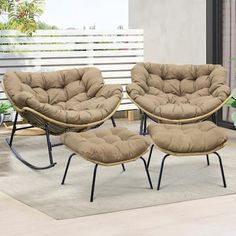 three chairs and one ottoman in front of a window with potted plants on it