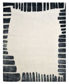 a black and white rug with lines on it