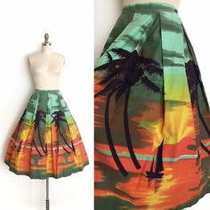 "vintage skirt  Era: 1950's Label: none Material: cotton Closure: back metal zipper, button waist Colour: green, orange, yellow, black  Details: vivid sun set scene with shadowed silhouettes of palm trees and sail boats in the distant horizon Fits like: small Waist: 26\" Hips: free Length: 30 Condition: excellent other than some very mild wash fade to the cotton. Priced accordingly. Washed and ready to wear.   shop policy  * All items are a final sale. No returns, exchanges and, order cancellations are not accepted.  * Ruby Mae Rose is not responsible for lost or stolen parcel(s) and any duty, import, VAT charges that are determined by the receiving country. Ruby Mae Rose will not mark the parcel as a 'gift' as this is illegal. Thank you for your understanding. * Vintage naturally shows si Ruby Mae, 1950s Skirt, Womens Skirts, Sun Set, Rose Vintage, 50s Vintage, Border Print, Star Dress, City Prints