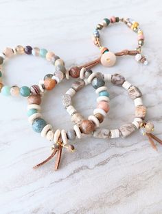 Beige Bohemian Beaded Bracelets, Earthy Multicolor Gemstone Beaded Bracelets, Bohemian Beige Bracelets With Round Beads, Beige Jewelry With Colorful Beads For Jewelry Making, Earthy Multicolor Beaded Bracelets With Natural Stones, Earthy Multicolor Hand-strung Beaded Bracelets, Earthy Multicolor Beaded Bracelet With Natural Stones, Bohemian Faceted Beads Bracelets For Everyday, Bohemian Bracelets With Faceted Beads For Everyday